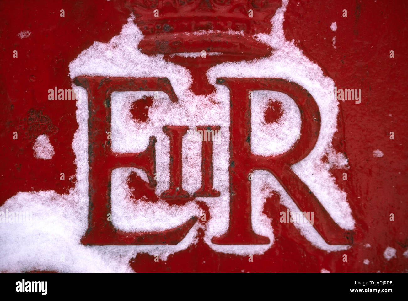 Communications Post Box winter royal E R crest detail with driven snow Stock Photo