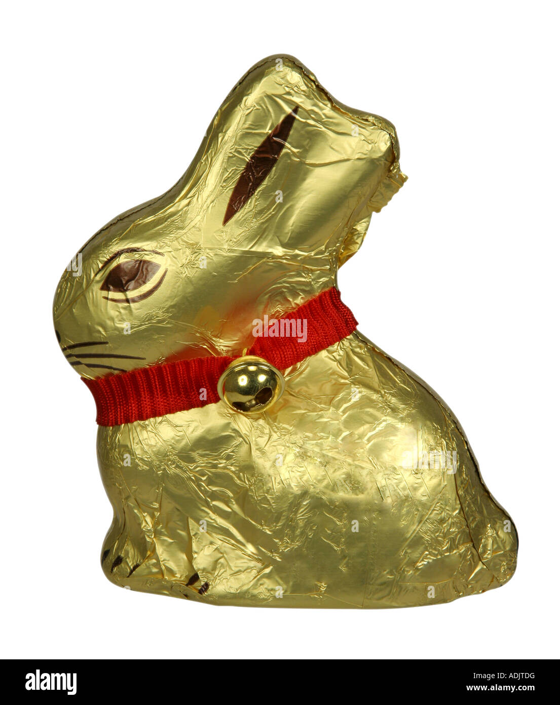 Easter chocolate bunny wrapped in original aluminium wrapper on white background Stock Photo