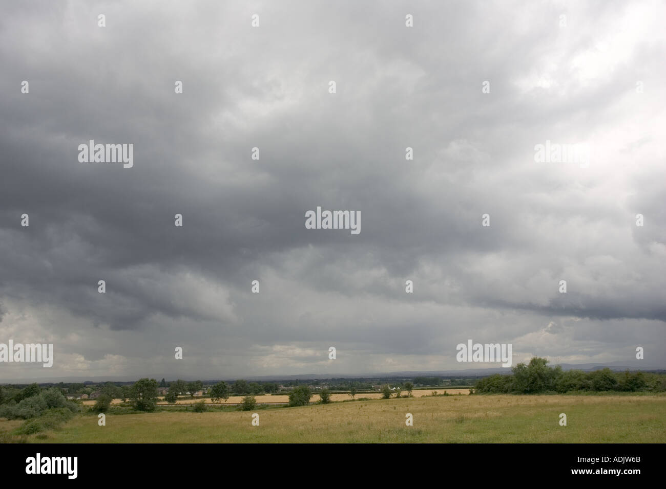 Cumulonimbus clouds threatening rain and thunder Cotswolds UK Stock Photo