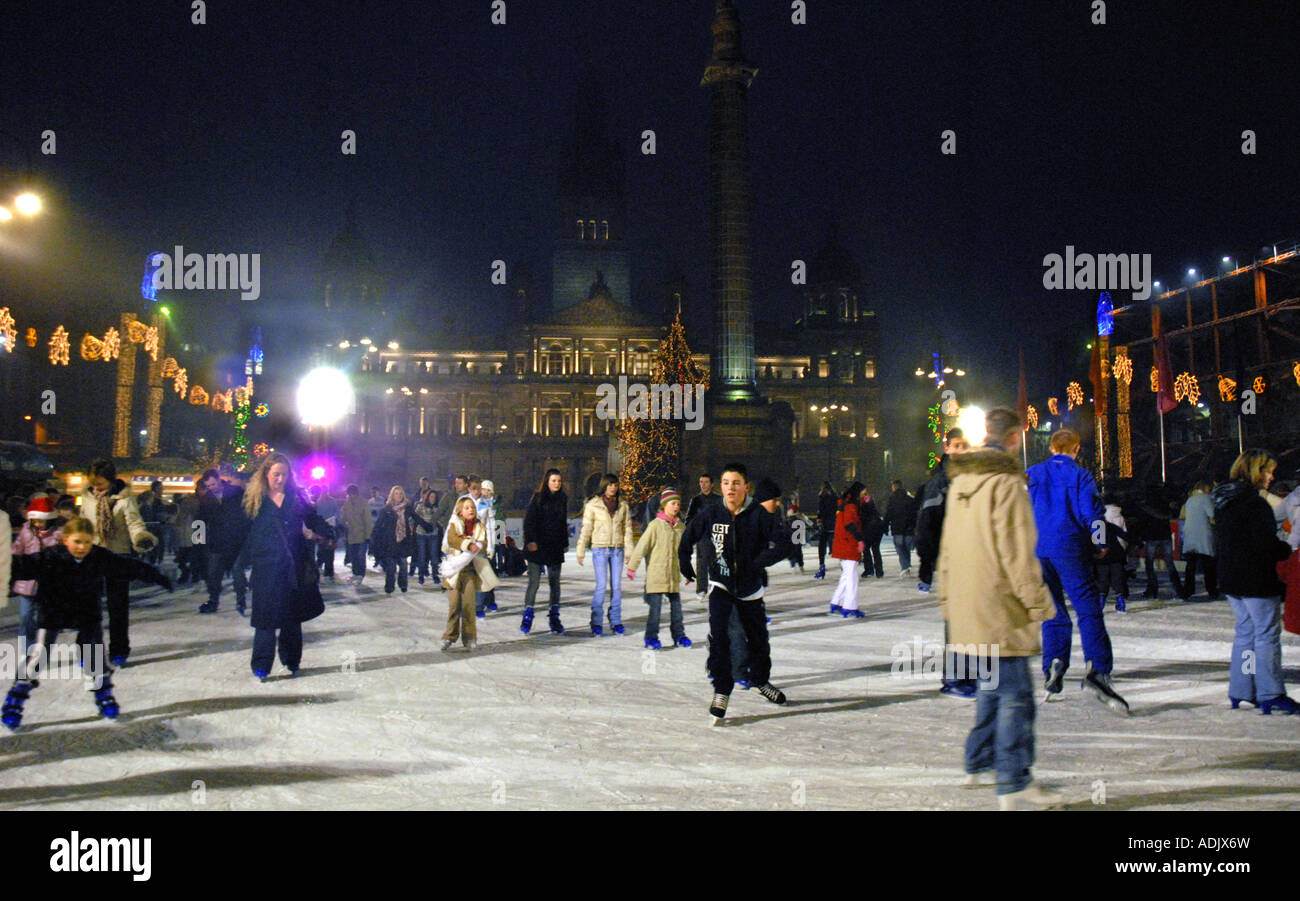 Ice Skating on Outdoor Ice Rink, Square. City Chambers in