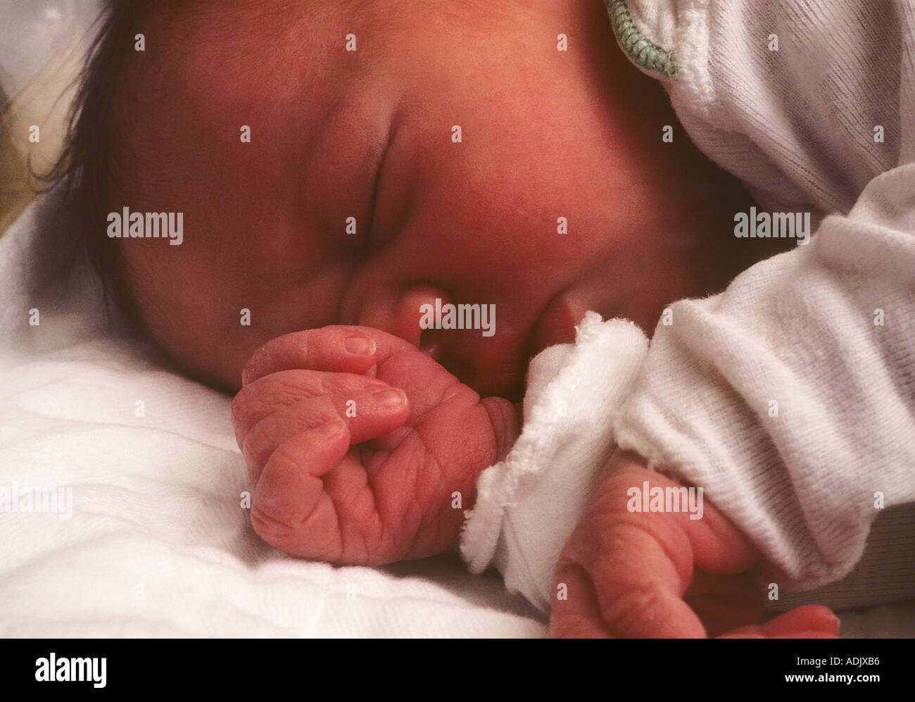 new born baby sleeping on side Stock Photo Alamy