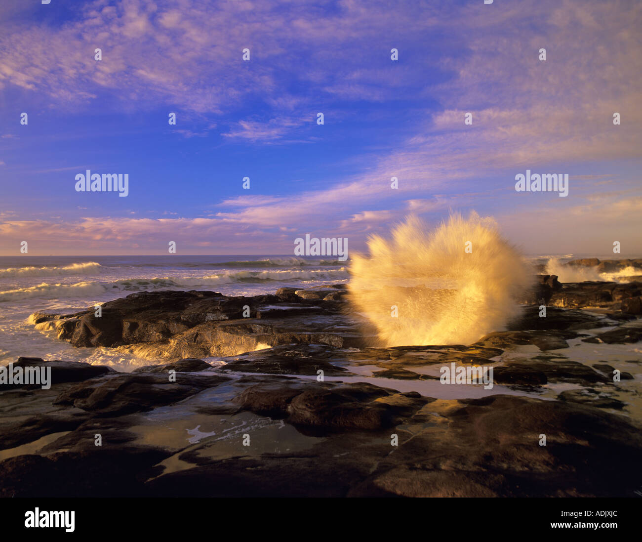 Storm waves and rocky shoreline at Smelt Sands State Park Oregon Stock Photo