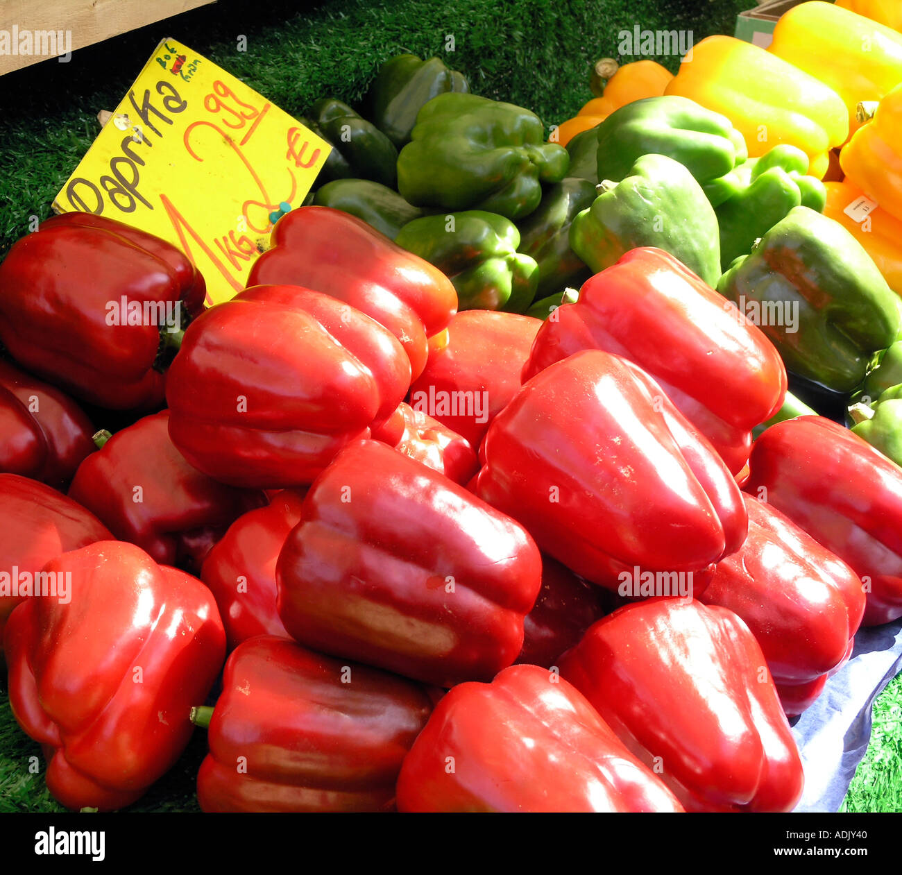 Fresh red peppers at market for sale Stock Photo - Alamy