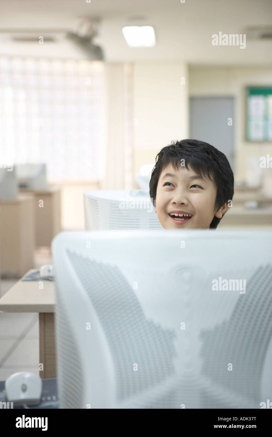 A boy in the computer lab Stock Photo Alamy
