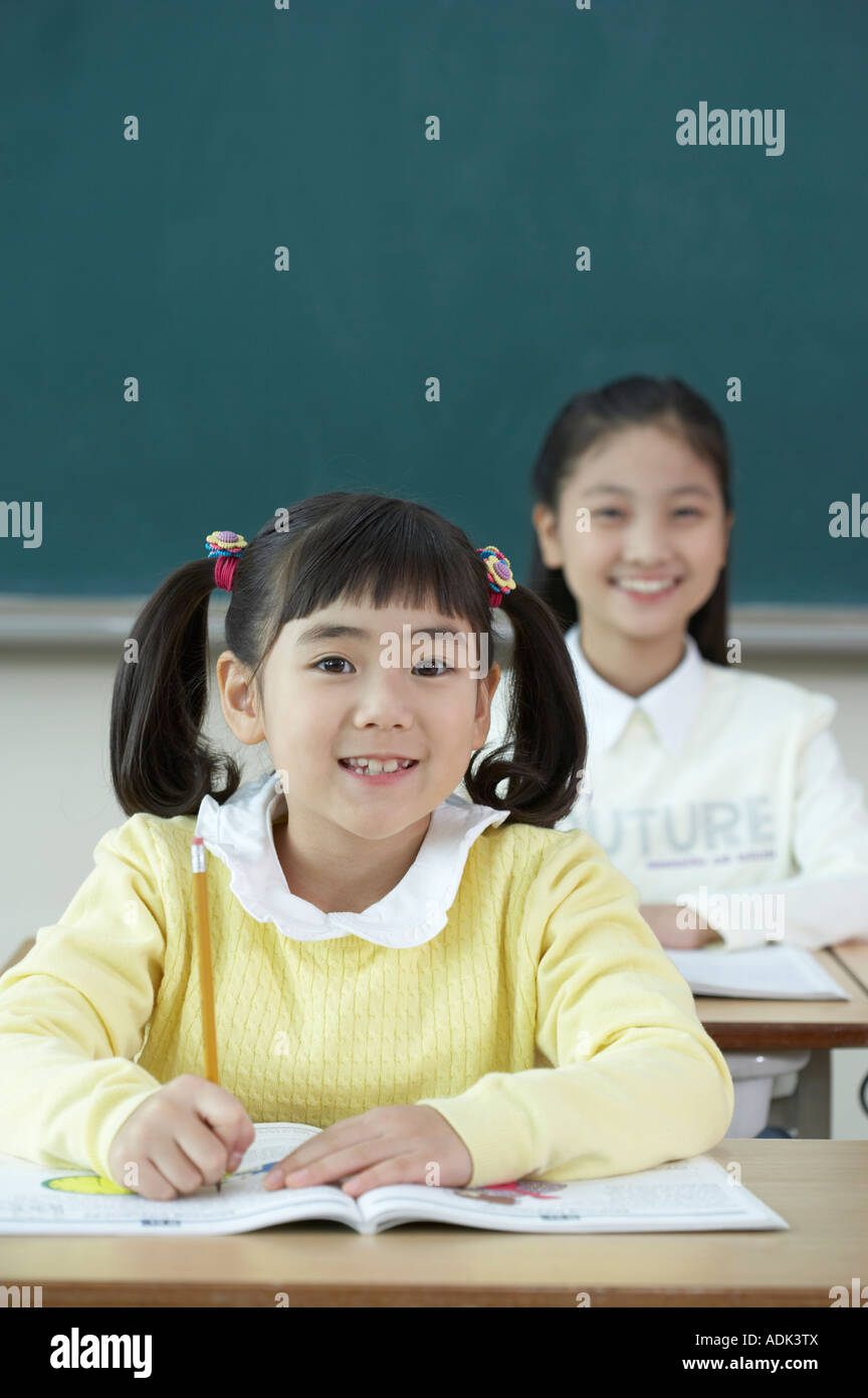 Girls in the classroom Stock Photo