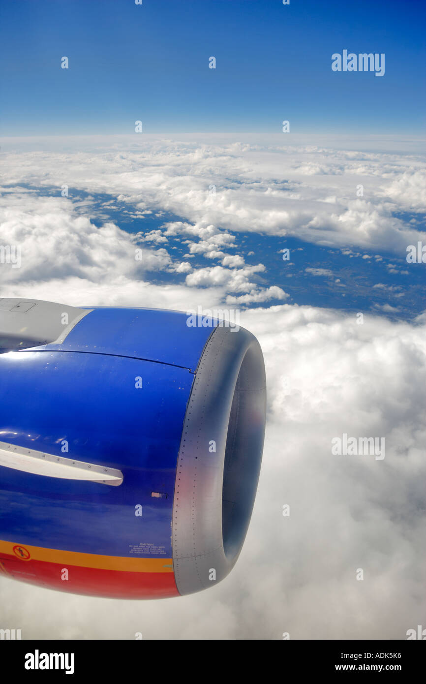 Flying clouds plane engine hi-res stock photography and images - Alamy