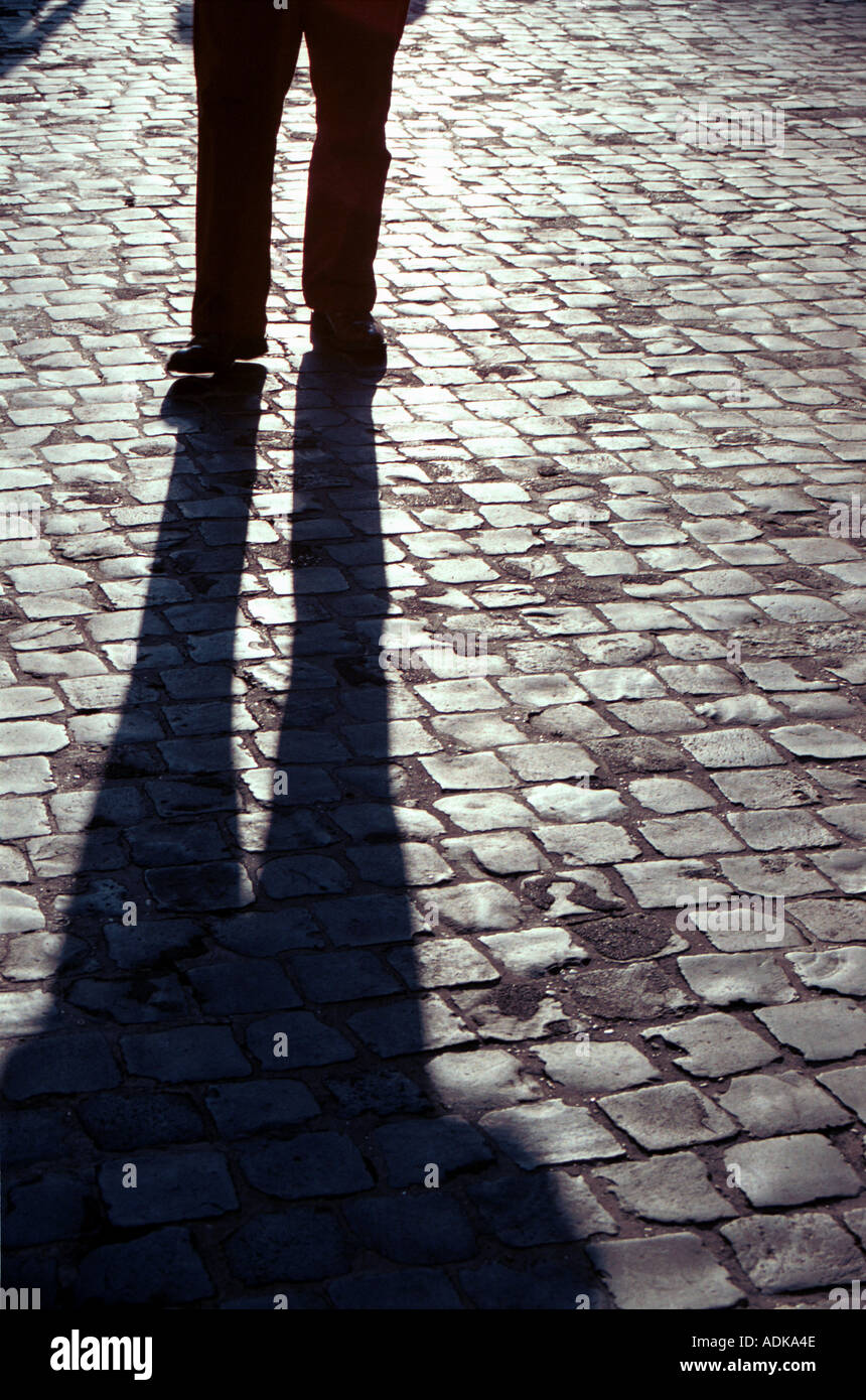 shadow of man s feet walking Stock Photo - Alamy