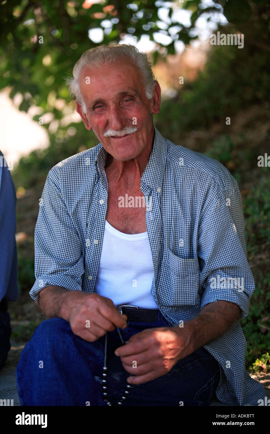 GREECE A PORTRAIT OF AN OLD MAN WITH HIS WORRY BEADS Stock Photo