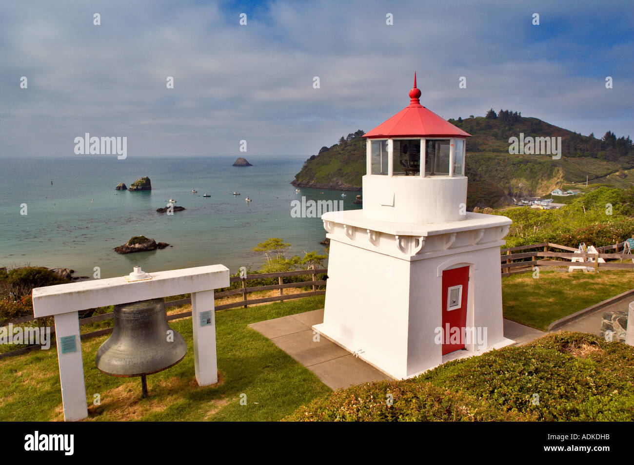 Trinidad Lighthouse with boats in harbor California Stock Photo