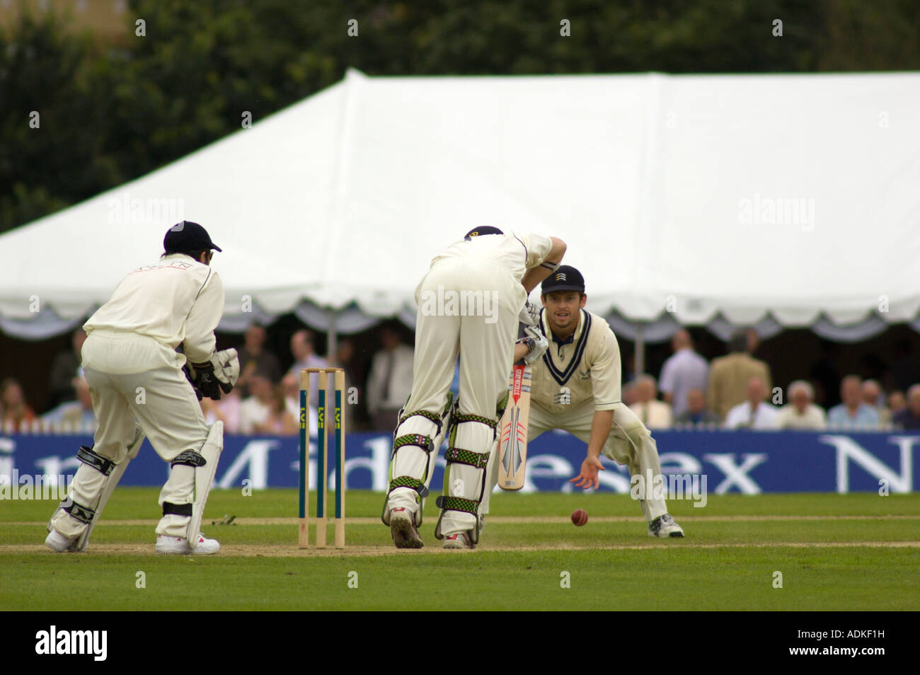 County cricket game. Middlesex v Derbyshire. Chad Keegan fielding. Stock Photo