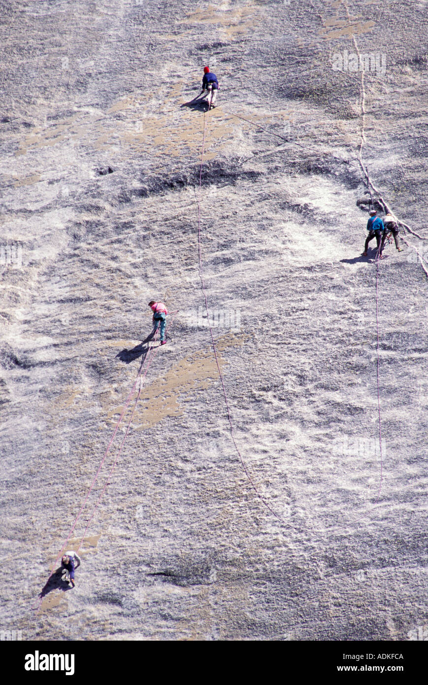 Rock Climbers on Steep Rock Face