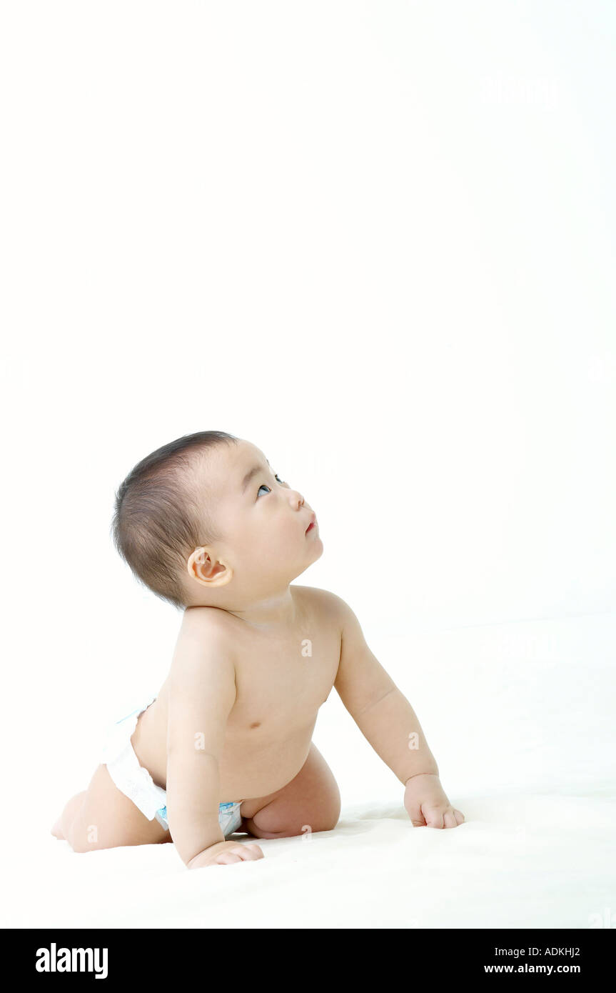 a baby looking upwards Stock Photo Alamy