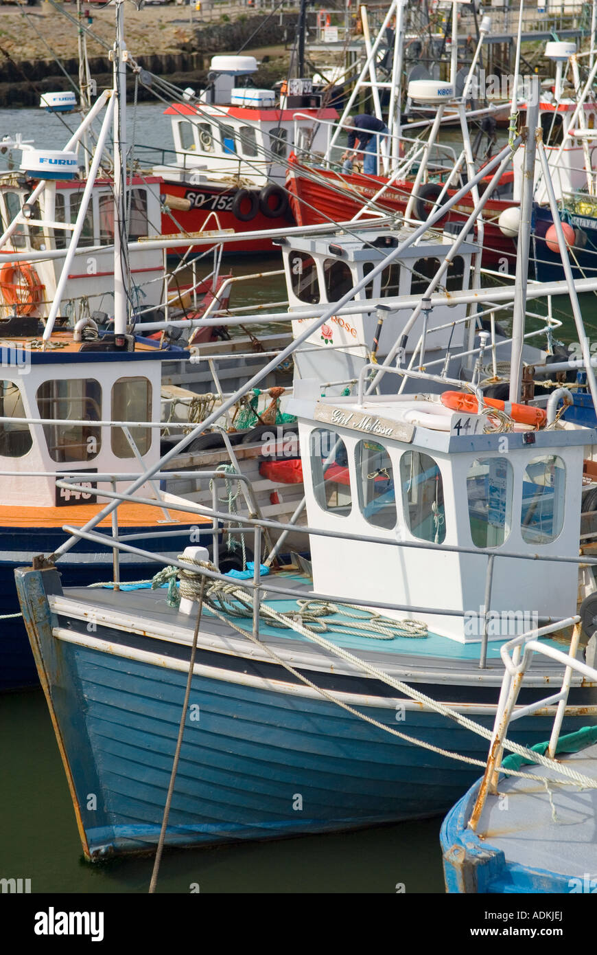 Fishing boats in the port harbour of Greencastle on the Inishowen shore of Lough Foyle in north Donegal, Ireland. Stock Photo