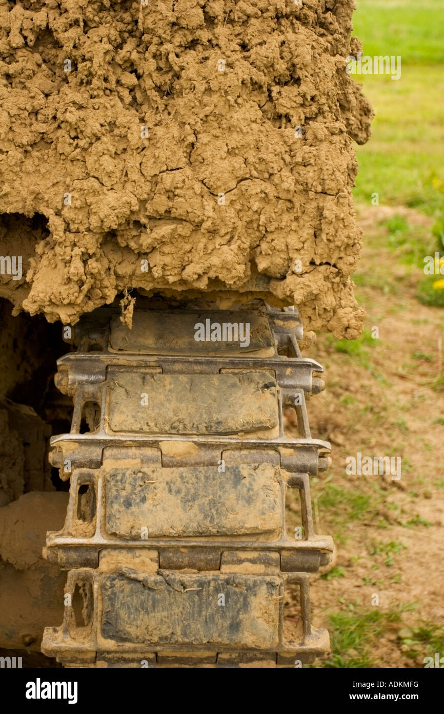 Rear view of a tank track covered in mud Stock Photo