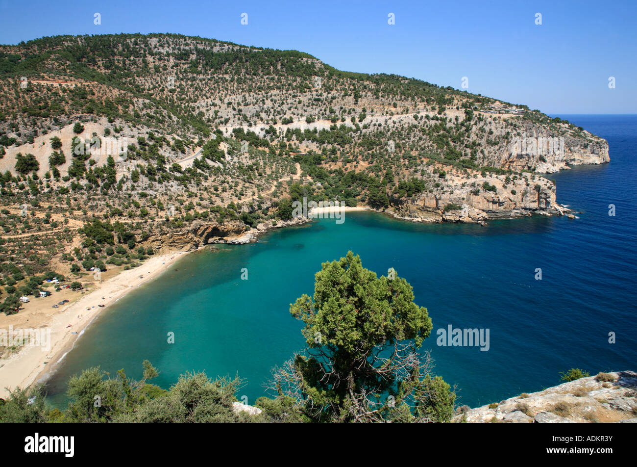 panoramic view across an idyllic bay near the Monastery of the Archangel Michael near Alyki on the island of Thasos in Greece Stock Photo