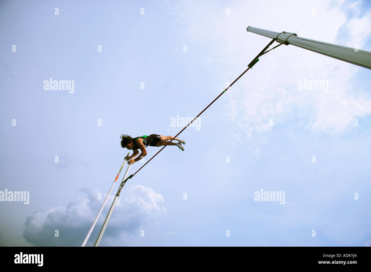 Man Pole Vaulting Stock Photo - Alamy