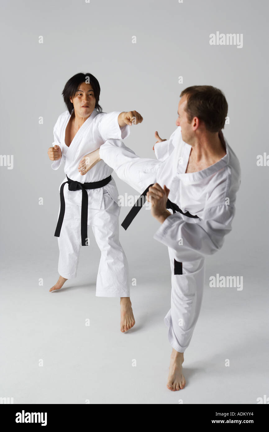 Two Blackbelts Sparring Stock Photo