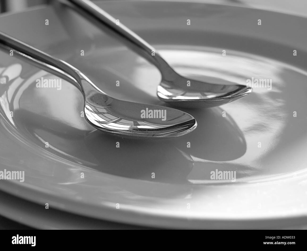 spoons on white plate Stock Photo