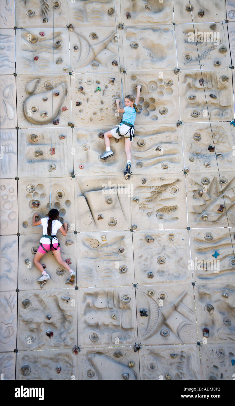 Ten Year Old Girls climbing at Six Flags Magic Mountain Valencia California United States of America Model Released Stock Photo