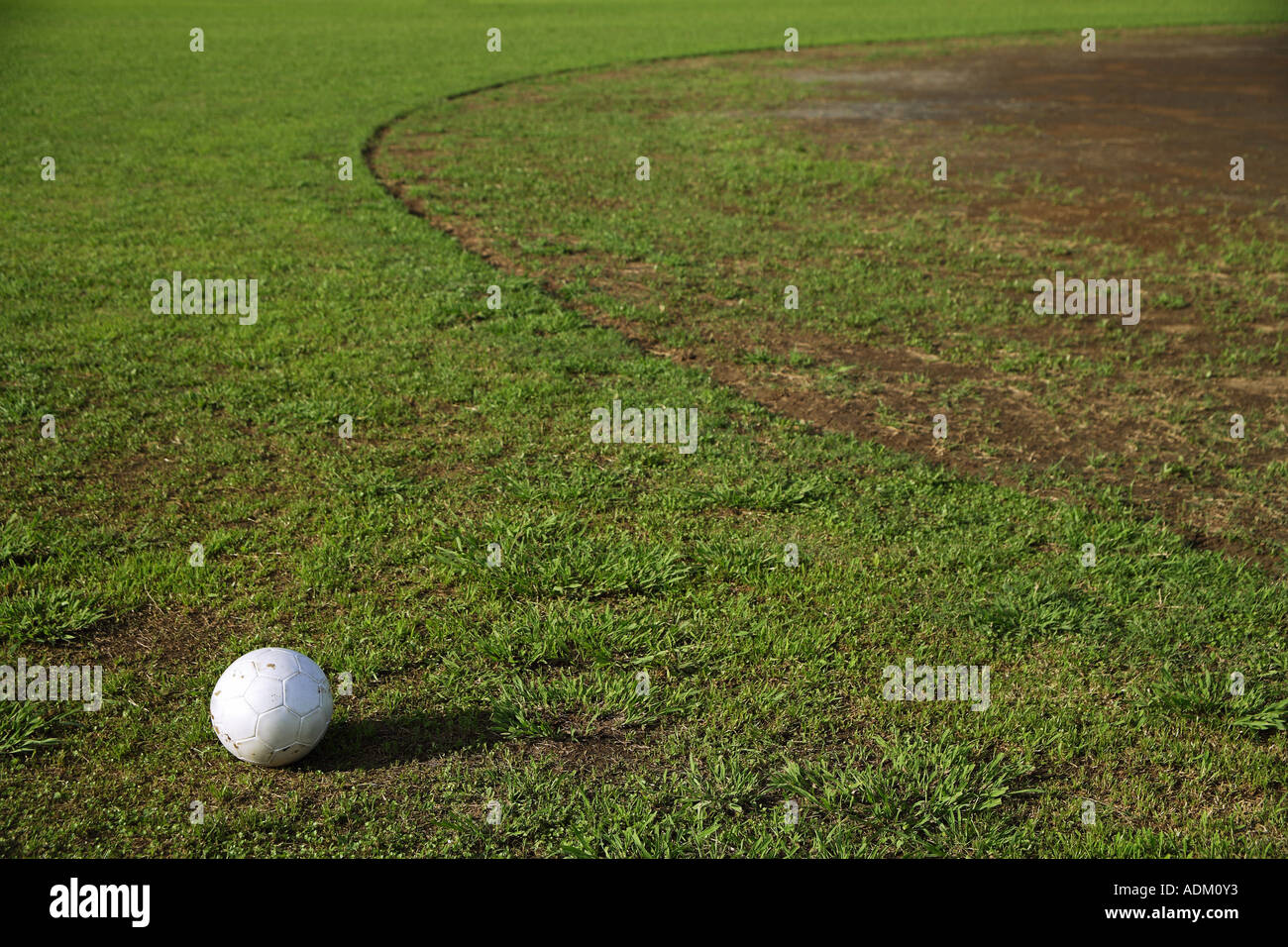Soccer Ball Lying On a Soccer Pitch Stock Photo Alamy