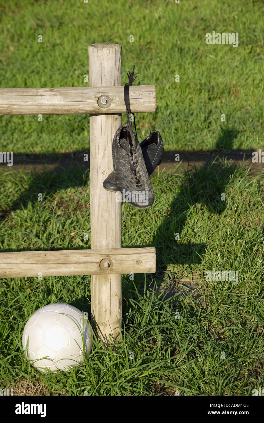 Soccer Cleats Hanging From a Wooden Fence Stock Photo Alamy