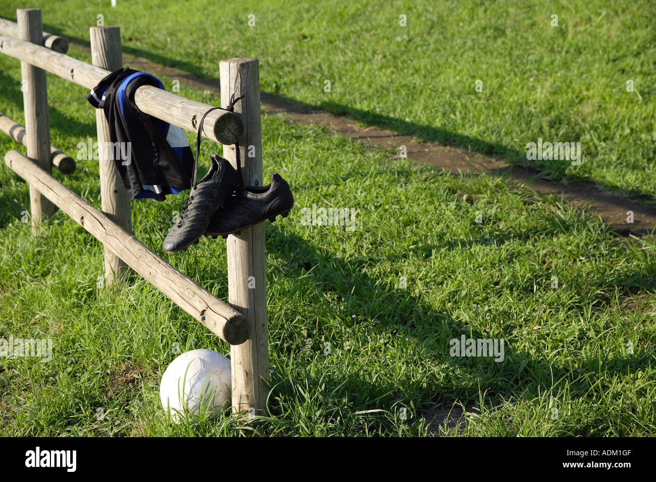 Soccer Cleats Hanging From a Wooden Fence Stock Photo Alamy