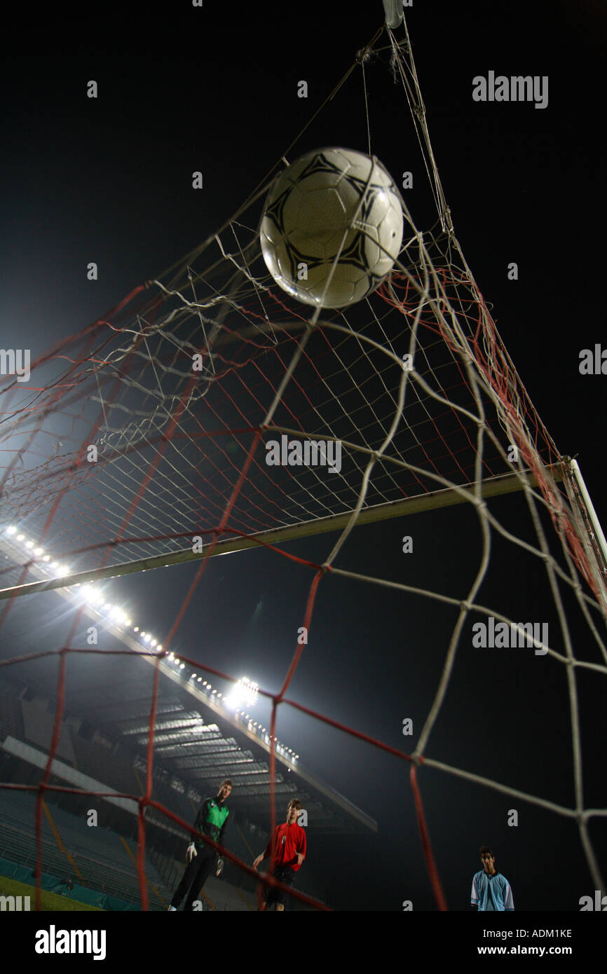 Soccer Ball Entering A Net Stock Photo - Alamy
