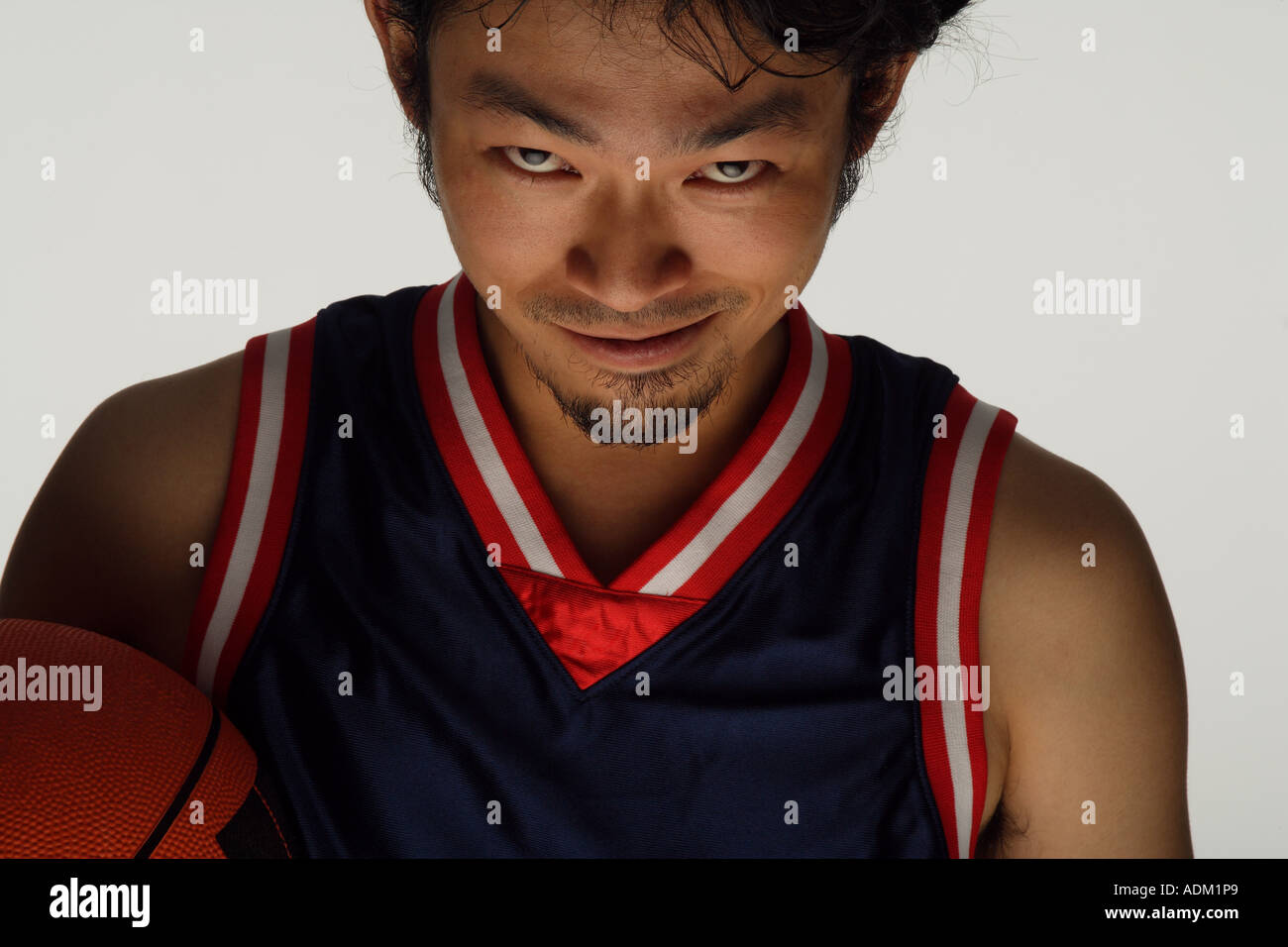 Asian Basketball Player Making a Scary Face Stock Photo