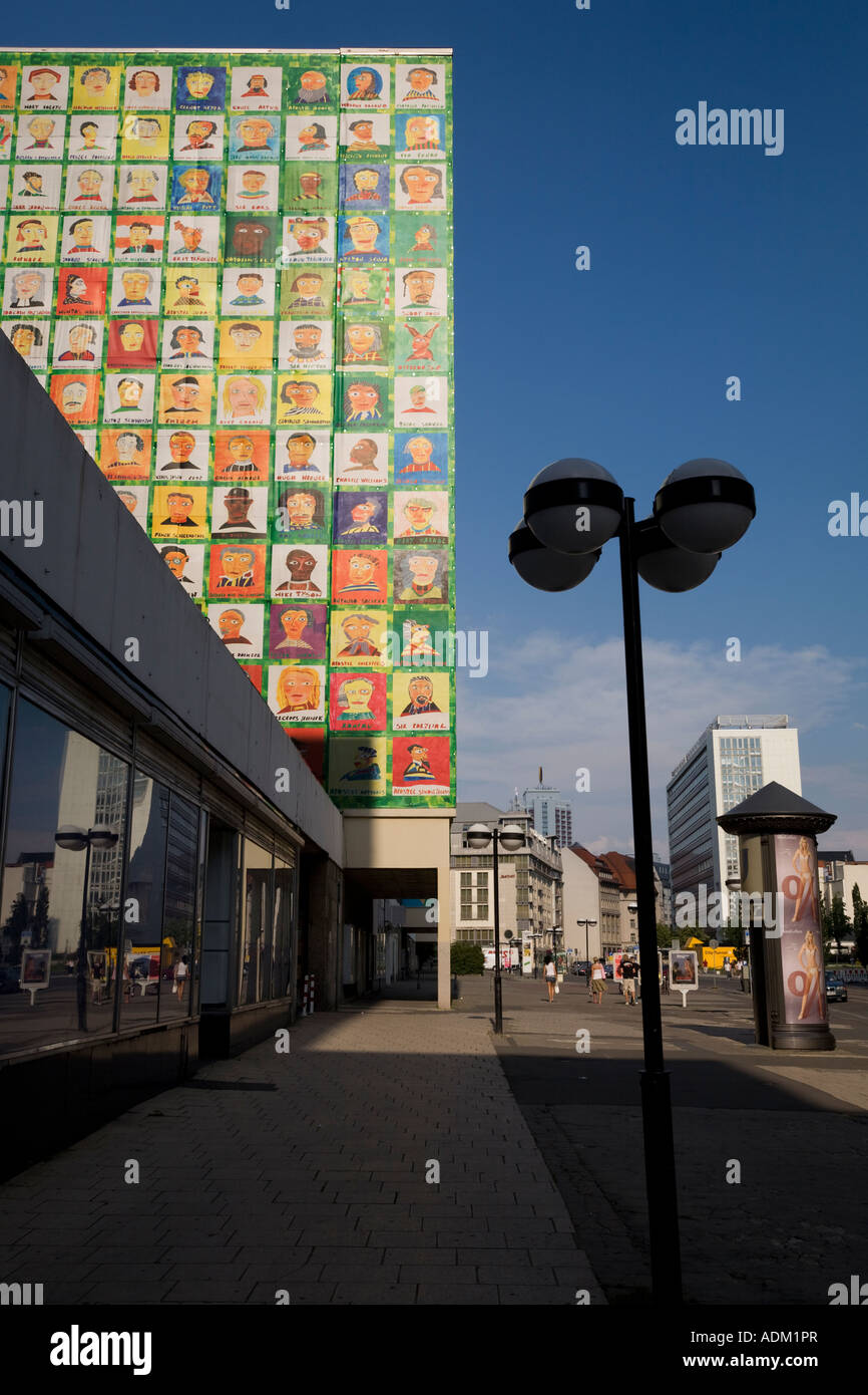 Portraits cover blocks of flats being refurbished Bruhl Strasse Leipzig