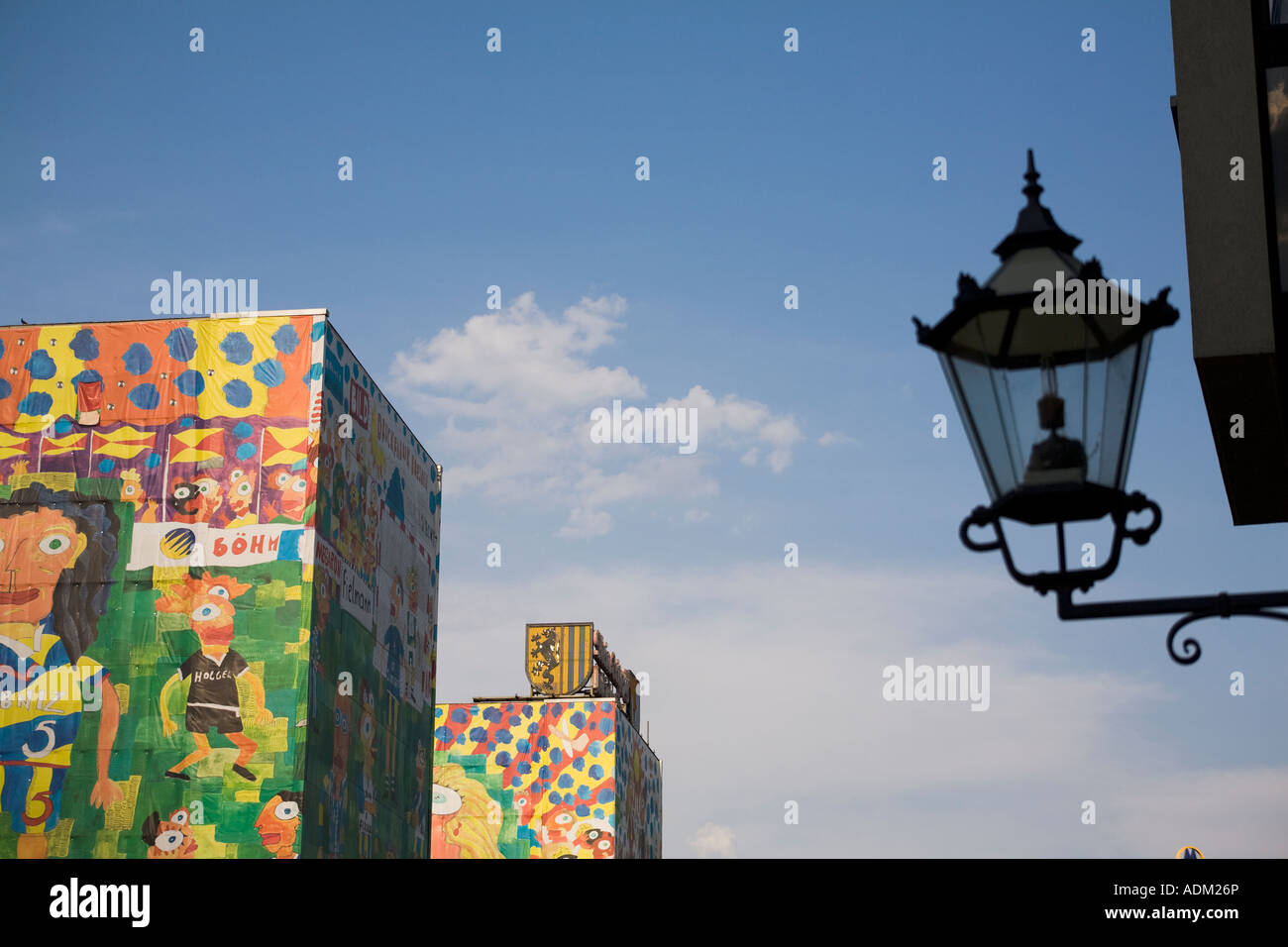 Portraits cover blocks of flats being refurbished Bruhl Strasse Leipzig