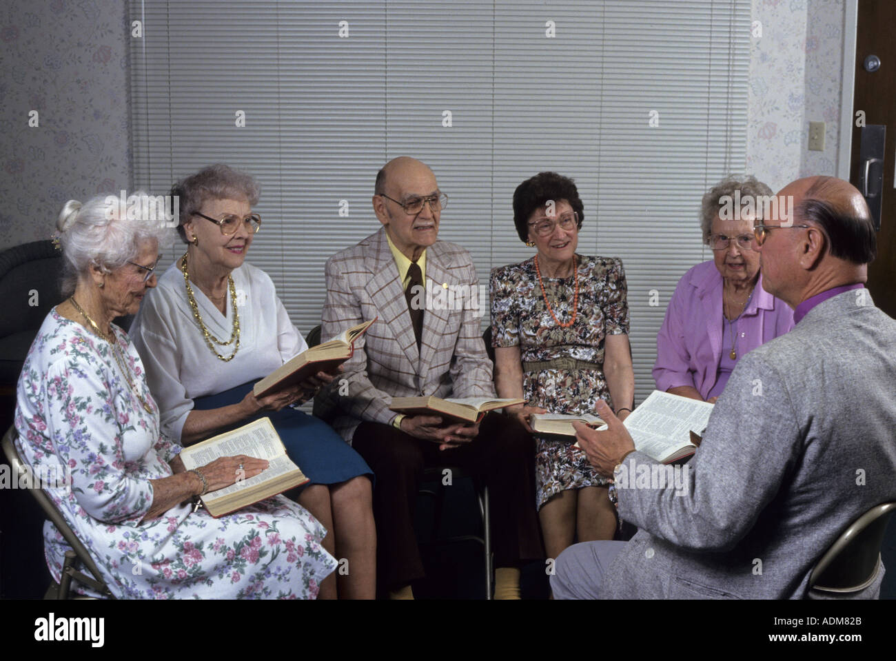Senior adults people friends friendships lifelong Bible study and prayer group circle from church   MR © Myrleen Pearson Stock Photo