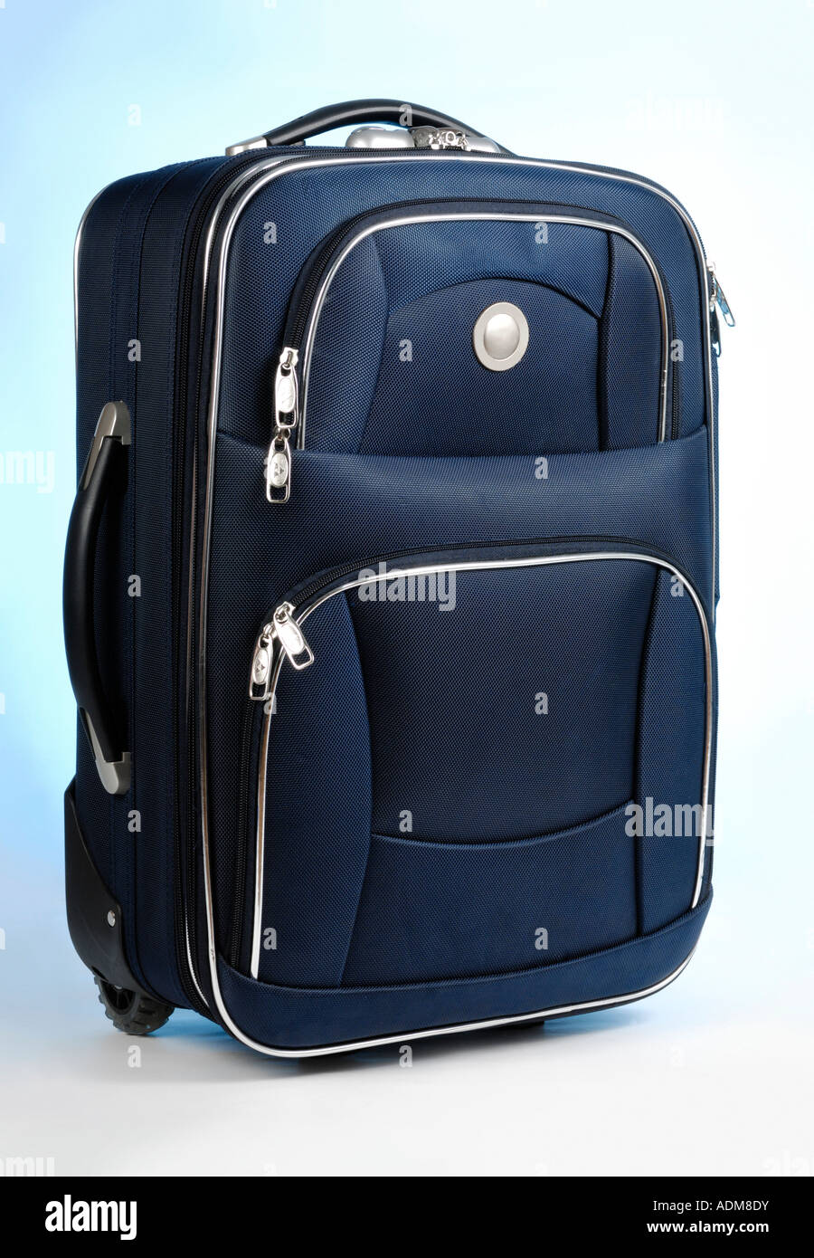 Blue travel suitcase  Isolated cutout baggage luggage bag case Stock Photo