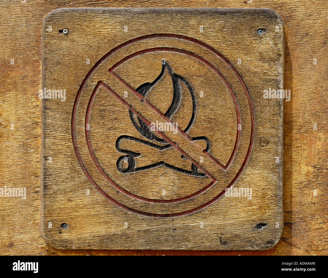 Prohibition sign on a wooden board No campfires Stock Photo