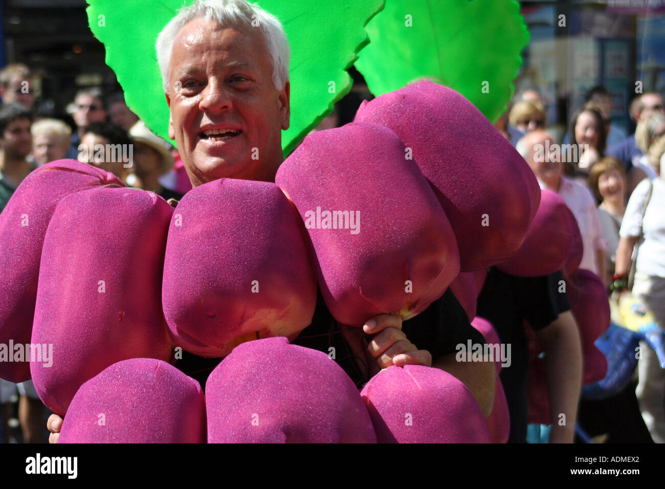 Performer in bunch of grapes costume. West End Festival, Byres Road