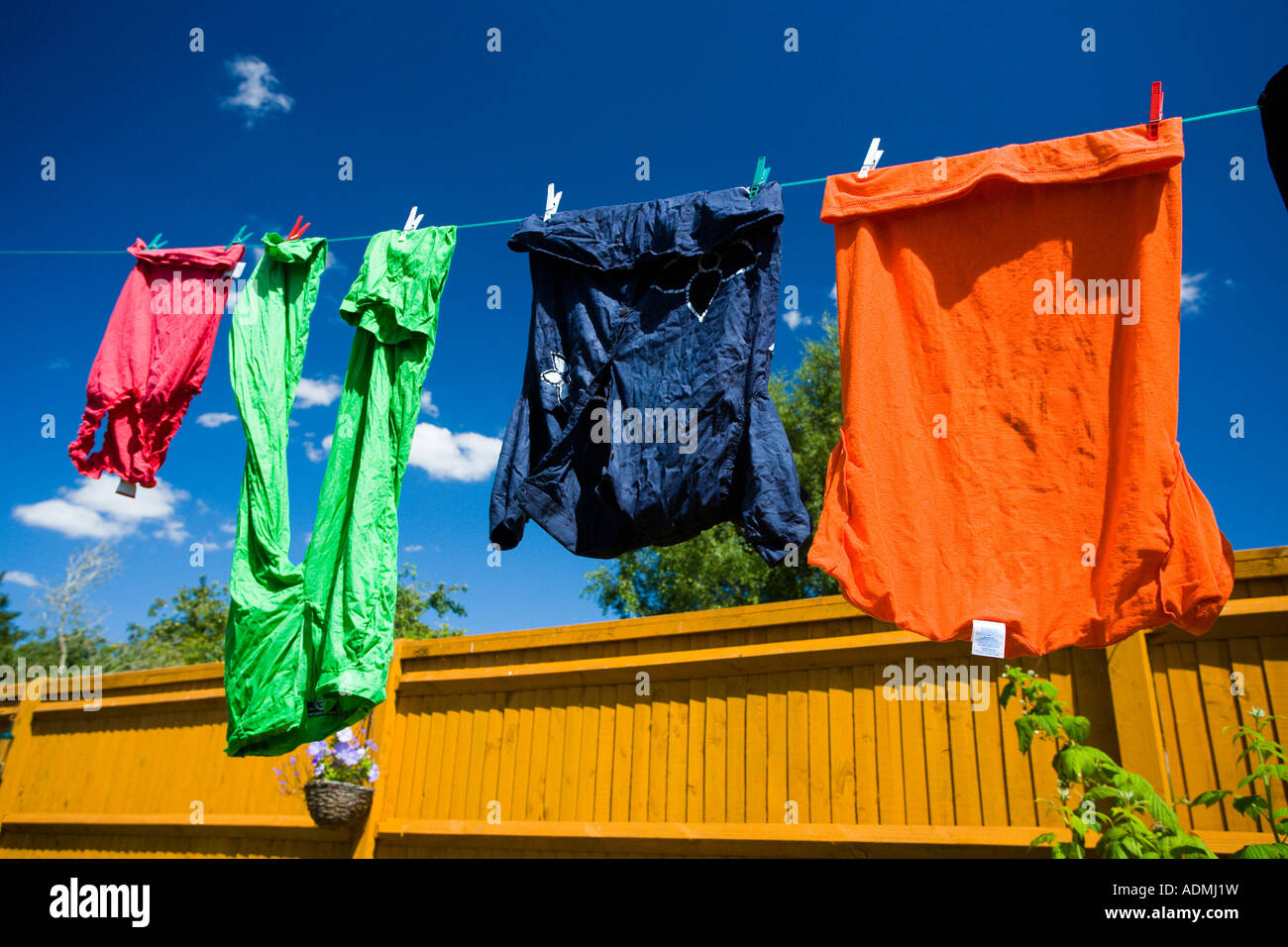 Laundry clean clothes fresh clean dry drying on the line against the