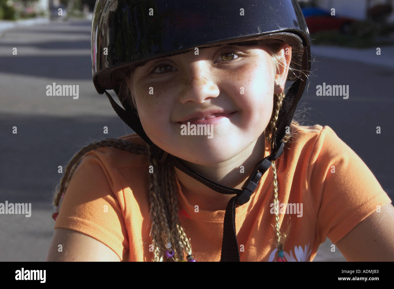 girl with bike helmet Stock Photo Alamy