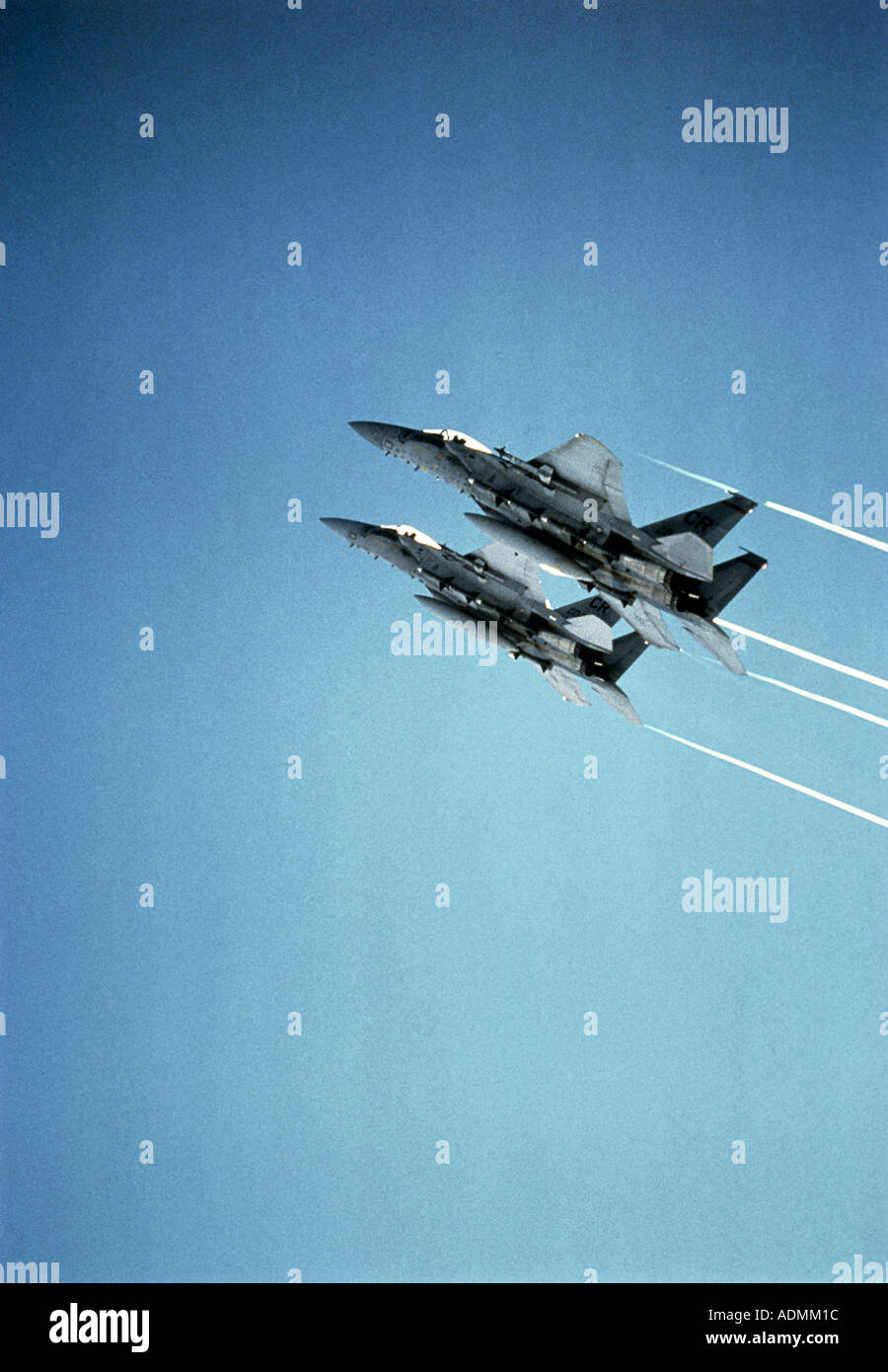 Low angle view of two F-15 Eagle fighter planes in flight Stock Photo