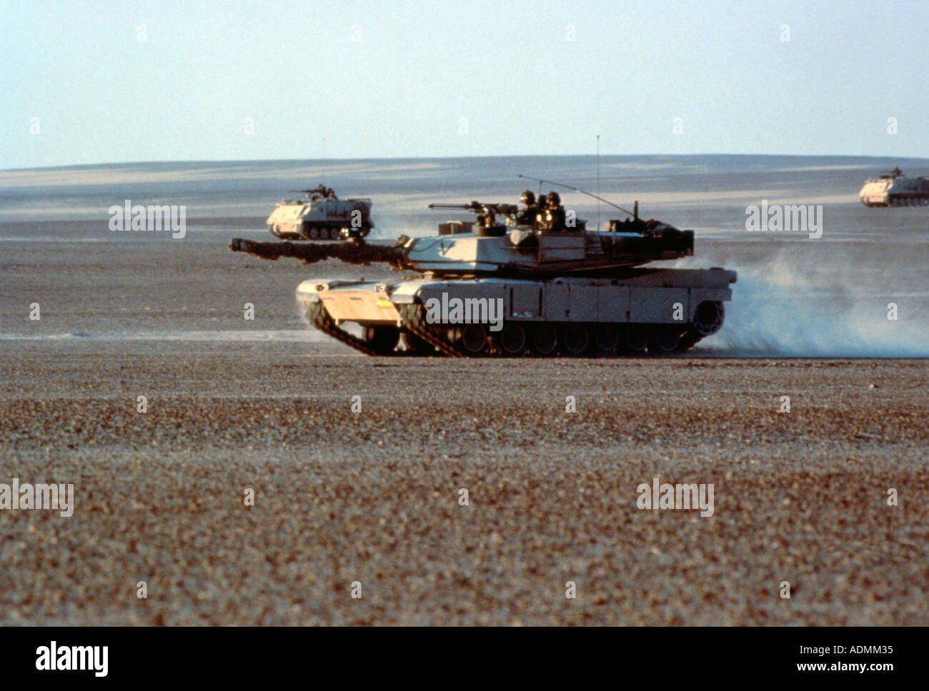 M-1 Abrams Main Battle Tank and M113 Armored Personnel Carriers in the Egyptian desert Stock Photo