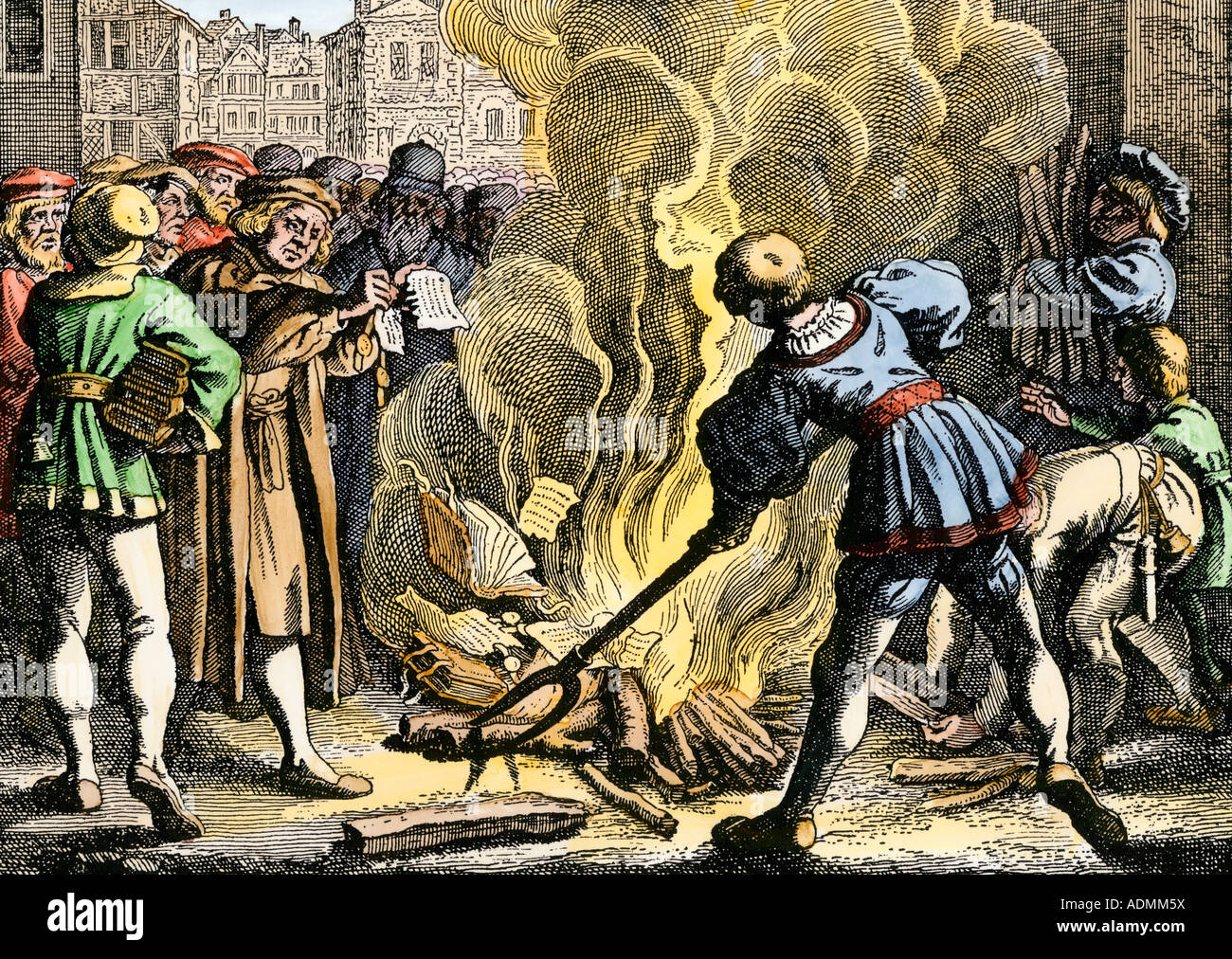 Martin Luther burning Papal Bull from Leo X excommunicating him in 1521 Wittenberg. Hand-colored woodcut Stock Photo