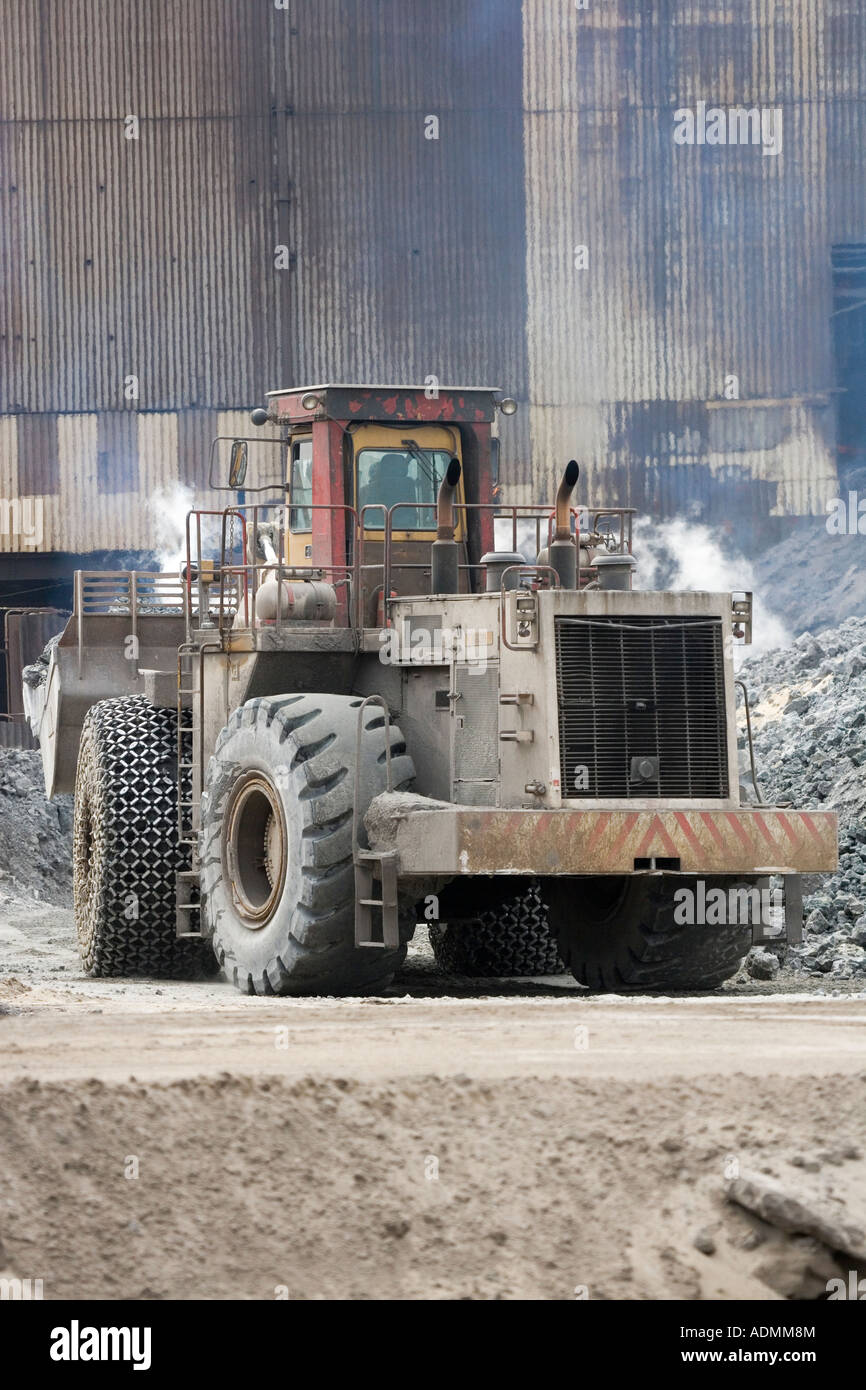A heavy loader tractor working at Redcar Steelworks Teesside Cleveland England UK Stock Photo
