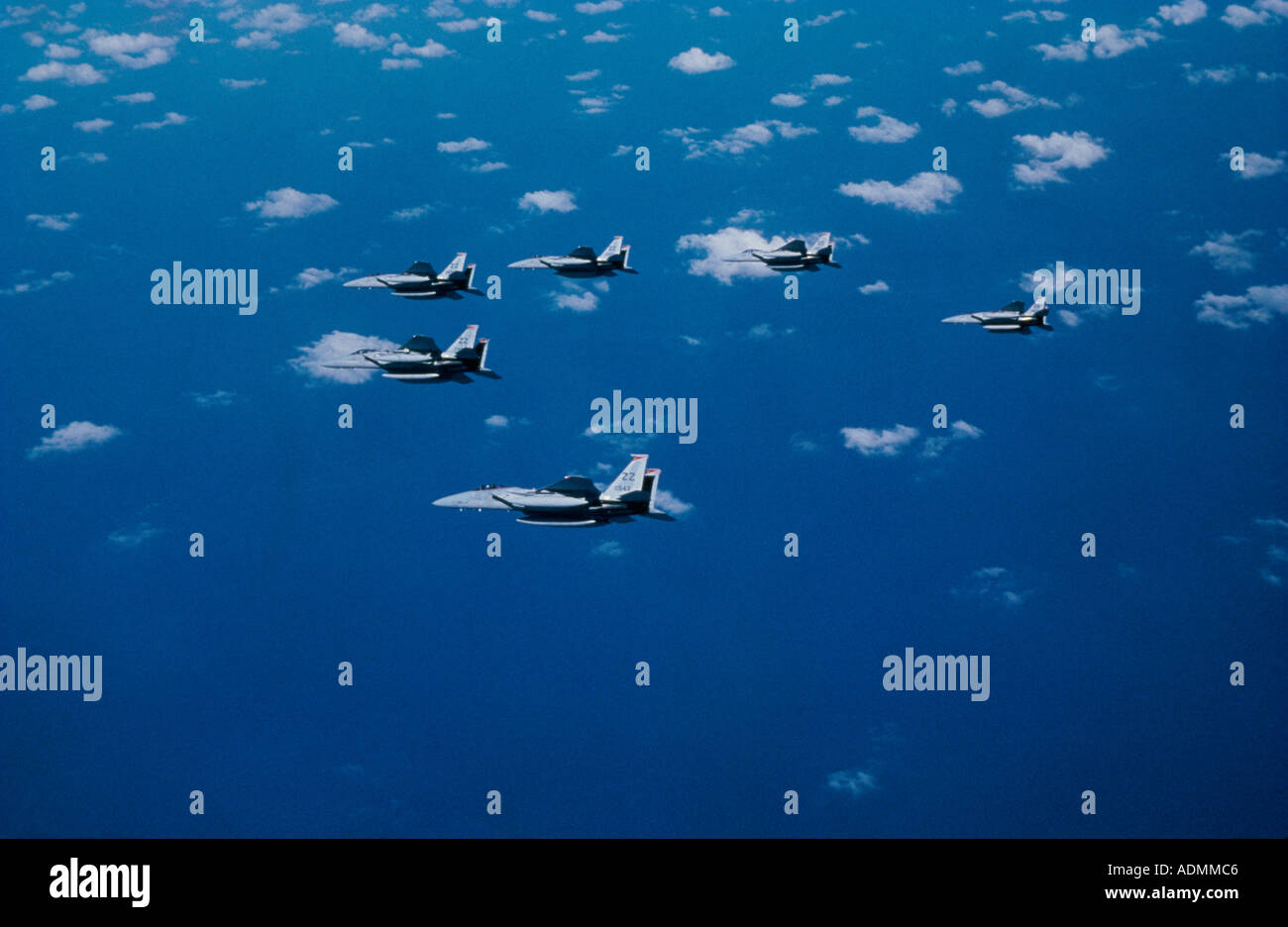 Aerial view of F-15 Eagle fighter planes flying in formation Stock Photo