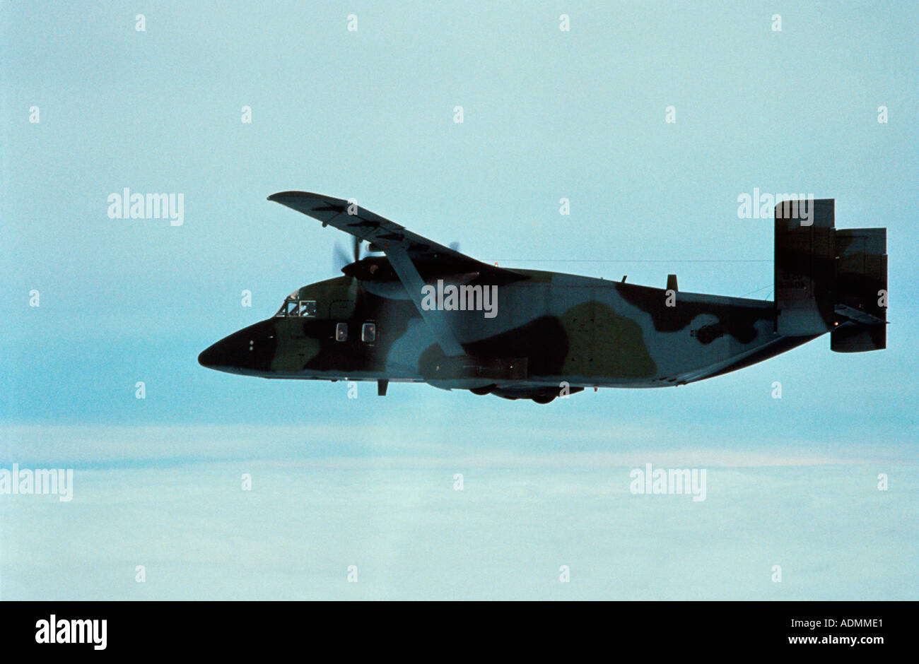 Low angle view of a C-23 Sherpa in flight Stock Photo