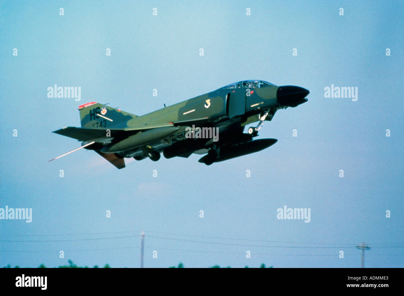 Low angle view of an F-4G Phantom II fighter plane in flight Stock Photo