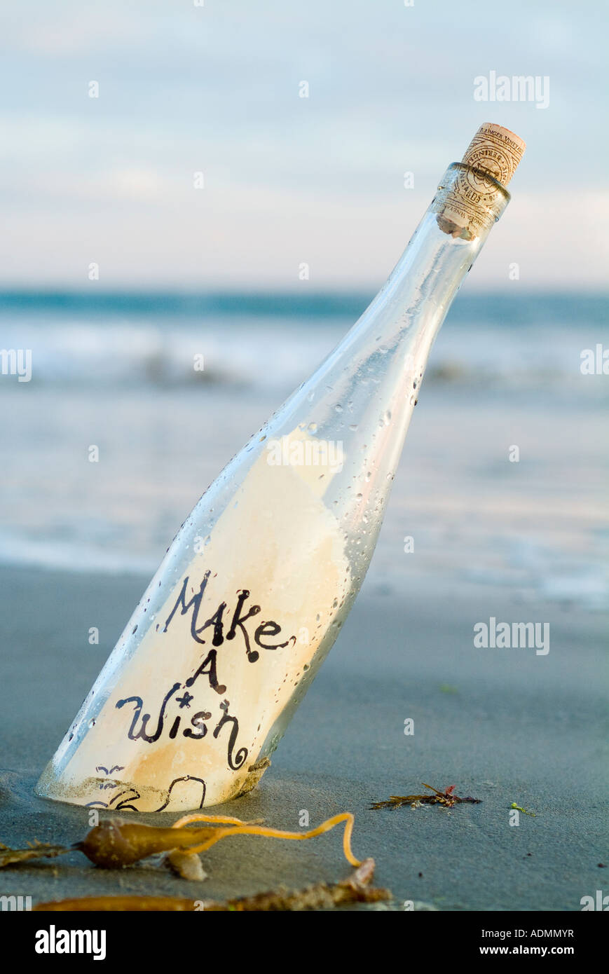 Bottle washed up on the beach with make a wish message and treasure map