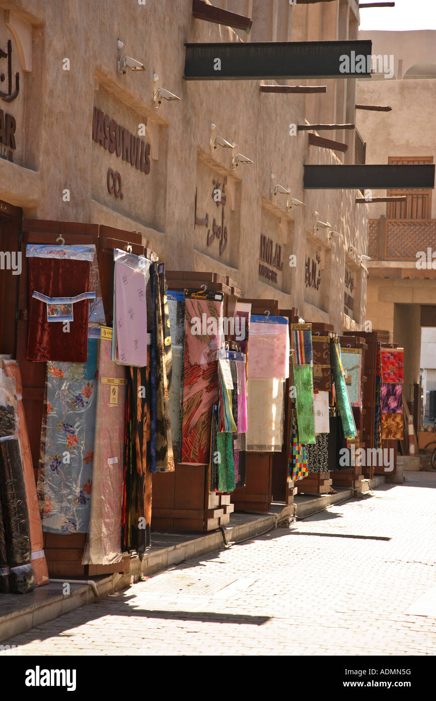 Narrow street in the textile souk Dubai city centre United Arab Emirates Stock Photo
