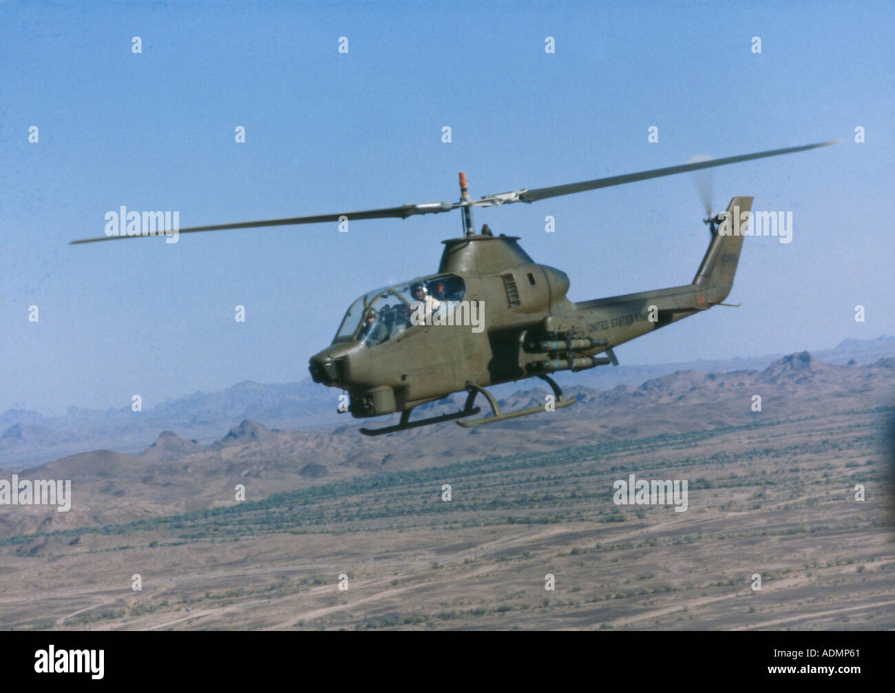 Low angle view of a Cobra Attack helicopter in flight Stock Photo