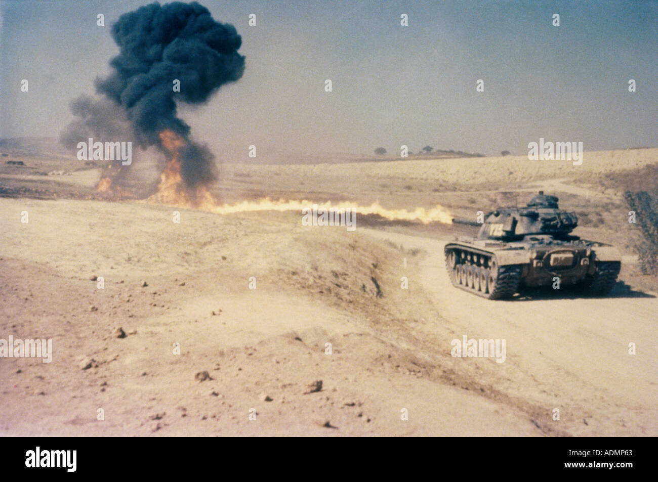 Military tank shooting at a target Stock Photo Alamy
