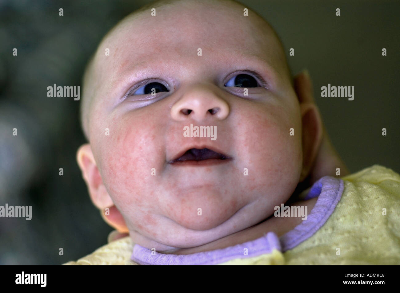 newborn looking at parents Stock Photo