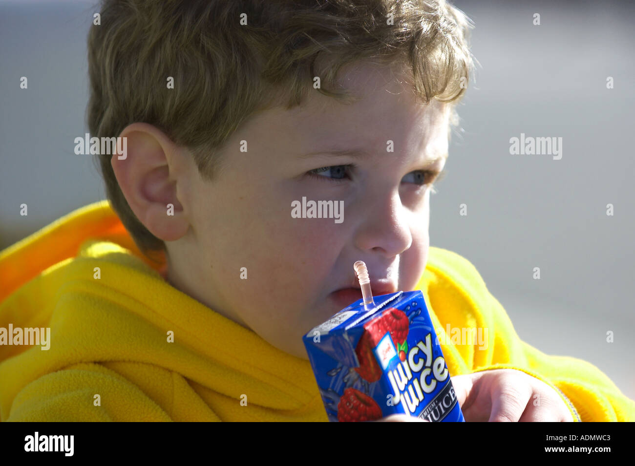 boy drinking juice box Stock Photo Alamy