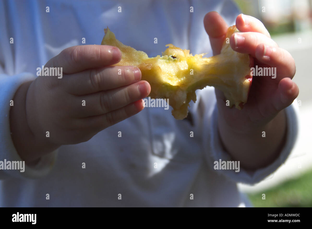 Children apple core hi-res stock photography and images - Alamy